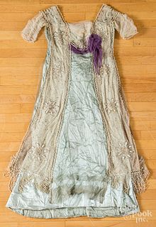 Hand sewn silk, lace, and pearl mounted dress