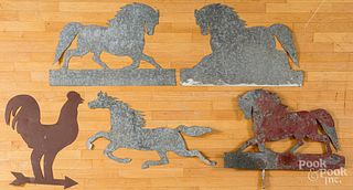 Four cut zinc horses and a rooster