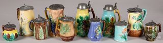 Collection of Majolica syrup pitchers.