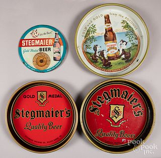 Four tin Stegmaier Beer advertisements