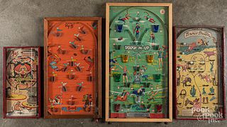 Four Poosh-M-Up table top pinball games