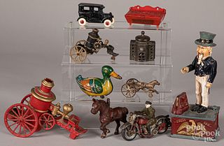 Group of cast iron toys, most reproductions.