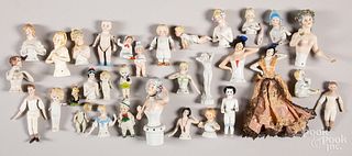 Collection of small bisque dolls and half dolls