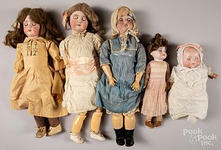 Five bisque head dolls