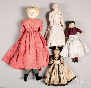 Four early dolls