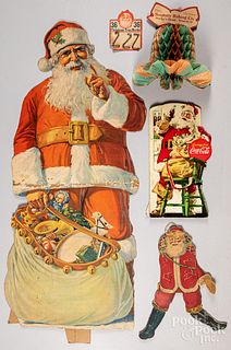 Group of cardboard advertising Santa and Christma