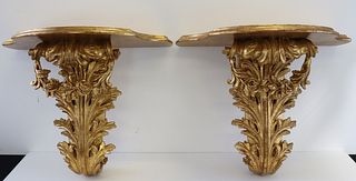 A Large Pair Of Italian Carved And Giltwood Wall
