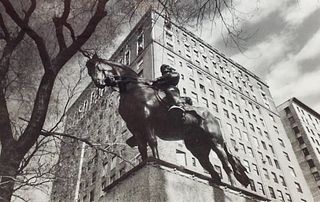 Black and White Photo of  man on horse monument