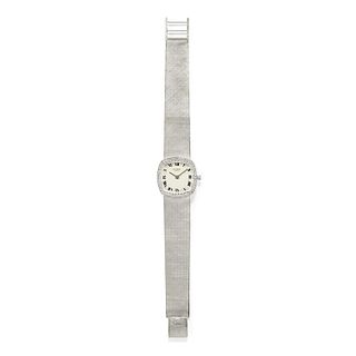 Universal - A 18K white gold lady's wristwatch, Universal