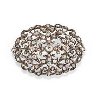 A silver, 18K yellow gold and diamond brooch, early 20th Century