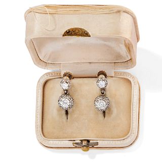 A platinum and diamond earclips, early 20th Century, with box