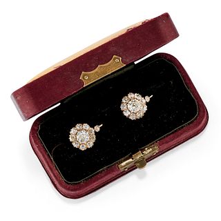 A 18K yellow gold and diamond earclips, early 20th Century, with box