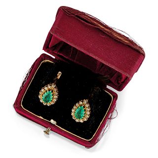 A 18K yellow gold, emerald and diamond earclips, early 20th Century