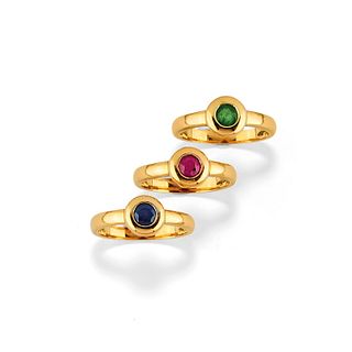 Three 18K yellow gold, sapphire, ruby and emerald rings