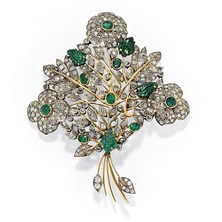 A silver, 18K yellow gold, diamond and emerald brooch