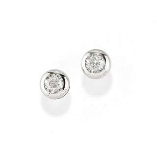 A 18K white gold and diamond earclips
