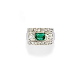 A 18K white gold, emerald and diamond ring, circa 1940