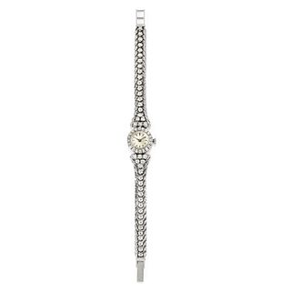Zenith - A 18K white gold and diamond wristwatch, Zenith