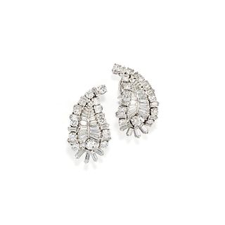 A 18K white gold and diamond earclips