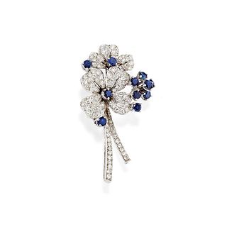 A 18K white gold, sapphire and diamond brooch