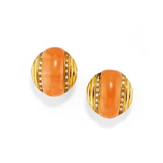 A two-color gold, coral and diamond earclips