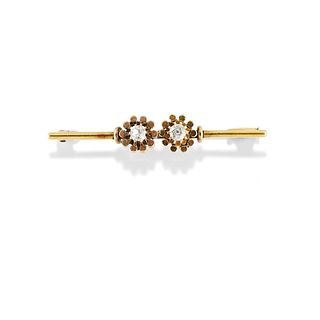 A 18K yellow gold and diamond brooch