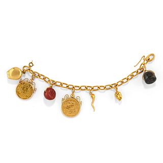 A 18K yellow gold charms bracelet