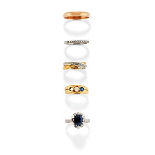 Five low-carat, 18K two-color gold, sapphire and diamond rings, defects