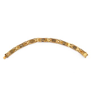 A 18K yellow gold and enamel bracelet, early 20th Century, defects