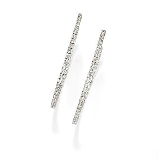 A 18K white gold and diamond earrings
