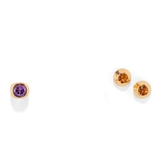 A 18K yellow gold and colored gemstone earclips and ring