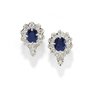 A 18K white gold, sapphire and diamond earclips, defects