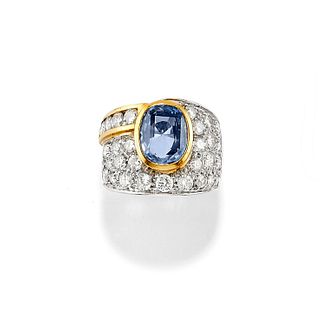 A 18K two-color gold, sapphire and diamond ring
