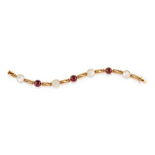 A 18K yellow gold and colored gemstone bracelet
