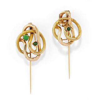 A couple of 18K yellow gold and green gemstone brooches, early 20th Century, defects