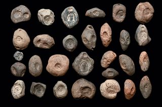 Lot of 29 Parthian clay bullae seals c.5th century AD. 