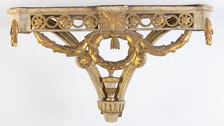 Consola esquinera Carlos IV en madera tallada, policromada y dorada. España, finales del siglo XVIII.