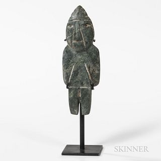 Greenstone Mezcala Figure, slender form, standing with grooved arms low on the torso, with sloping shoulders, face with grooved mouth a