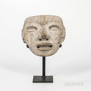 Pre-Columbian Stone Funerary Mask, Teotihuacan, Mexico, c. 450-650 AD, the large eyes deeply drilled at the corners for inlays, under s