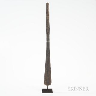 Lake Sentani Wood Food Spatula, early 20th century, the upper part decorated in the typical abstracted curvilinear decoration found on