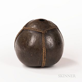 Fijian Coconut Vessel, 19th century, large coconut wrapped with sennit fiber, with inventory number, "D.28", painted on the bottom, ht.