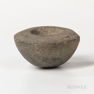 Hawaiian Stone Kahuna Bowl, Kapuahikuni 'ana ana, late 18th/19th century, basalt, a carefully carved stone vessel with a slightly curve