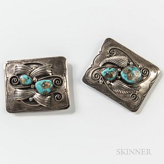Two Navajo Silver and Turquoise Belt Buckles, rectangular buckles with applied scroll and feather motifs, each with two large turquoise