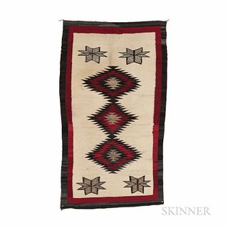 Navajo Regional Rug, the dark border, framed with red, the natural interior with four star devices and three central serrated joined di