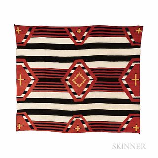 Late Classic Navajo Chief's Blanket, finely woven in natural yellow and cream, two different indigo dyes, dark brown and synthetic red