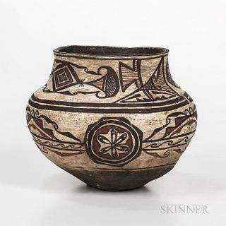 Southwest Polychrome Pottery Olla, Zuni, last quarter 19th century, the inner rim painted black, with alternating scroll and geometric
