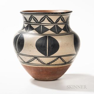 Large Santo Domingo Pottery Olla, concave base with round midsection and high flared neck, painted on the body with floral and geometri