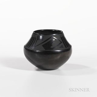 San Ildefonso Black-on-black Pottery Jar, signed "Marie and Santana" on the base, with tapered neck and feather pattern, and abstract s