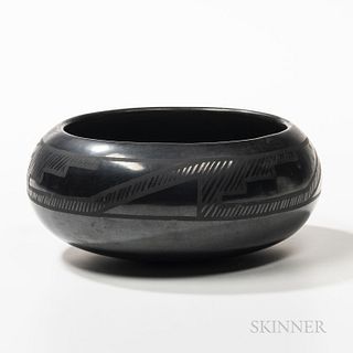 San Ildefonso Black-on-black Pottery Bowl, signed "Marie and Julian," with classic cross-hatched stepped design below the rim, ht. 3 1/
