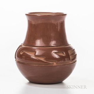 Contemporary Santa Clara Carved Redware Jar, signed on the base "Margaret Tafoya," the tall-necked form with deeply carved stepped and